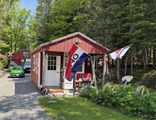 Our second building includes the largest collection of buttons for sale in Maine, along with quilts, art and paper/ephemera.