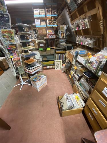 This same corner upstairs now houses our extensive paper department, where you'll find books, magazines, maps, advertising and other ephemera.