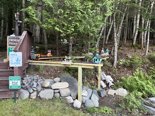 On Saturdays in the summer, visitors are invited to see model trains run on this outdoor railroad and more running model trains in the garage.
