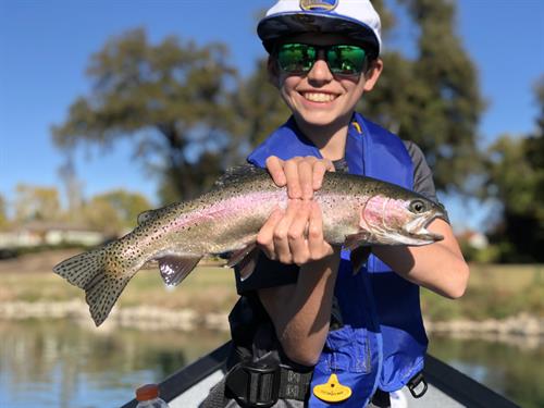 Kids rule!!!! landing a beautiful rainbow trout on the Lower Sacramento River creates memories for a lifetime