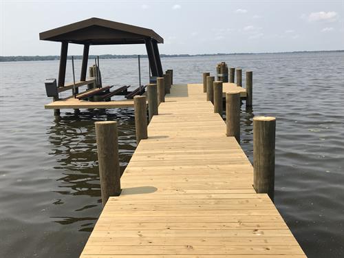 Permanent dock, boat lift, and roof