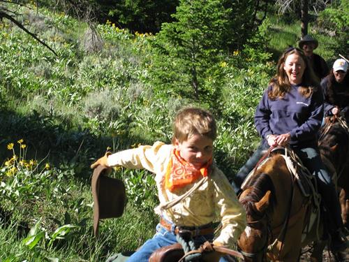 Kids ride their own horse on the trail beginning at age 6