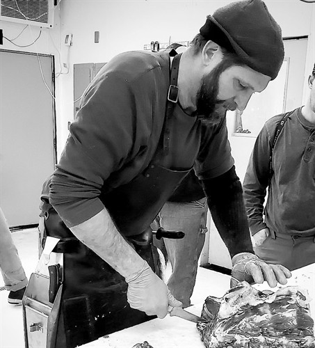 Bradley leading Beef Processing 101 class.