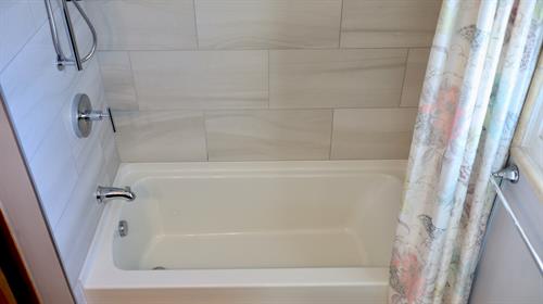 Newly redone bathtub and tiles
