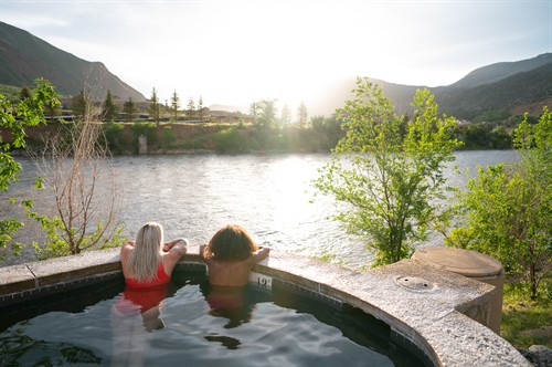 Soak riverside; our geothermal hot springs overlook the Colorado River