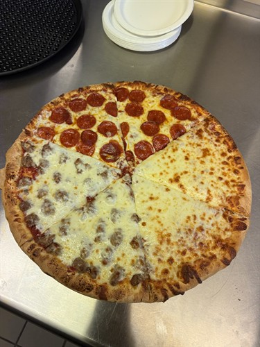 Variety of pizzas and slices for every taste.