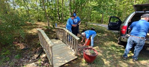 Greater Piedmont REALTORS® participated in Madison Day 2025 - where they helped an elderly couple with landscaping and fix a rotting bridge.