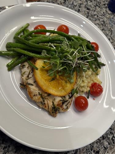 Roasted Chicken Breast with Couscous, Green Beans, Blistered Cherry Tomatoes. 