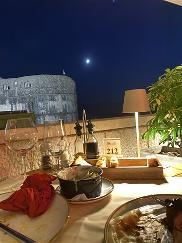 The moon over the walled city, Dubrovnik Croatia.