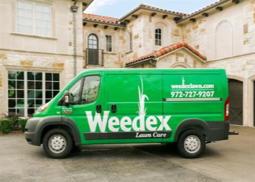Weedex Lawn Care Service Van at Customer's Home