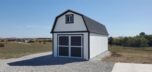 This 12x20 Premier Pro Tall Barn is a great addition to this property as a workshop and storage shed.
