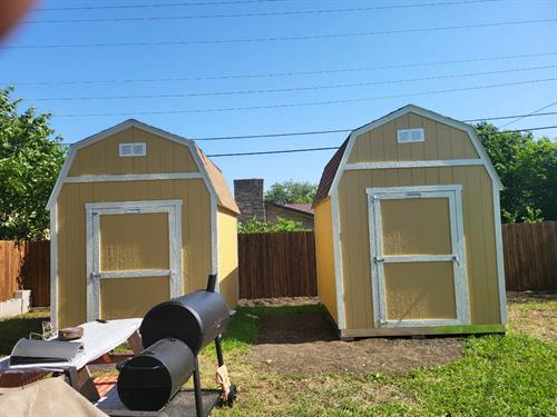 These Twin Premeir Tall Barns make great his and hers sheds. 
