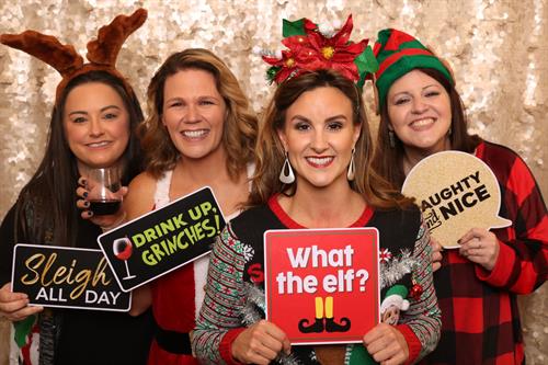 Christmas parties and photo booths were meant to be. 