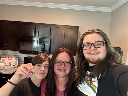 Residents Getting Their Keys to Their New Apartment