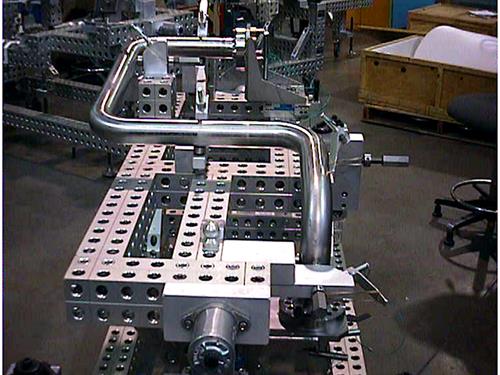 Boeing/Rocketdyne (Canoga Park, CA) RS68 LOX fixture with trunnion for rotation and ergonomic assembly. Boeing/Rocketdyne (Canoga Park, CA) RS68 LOX fixture with trunnion for rotation and ergonomic assembly.