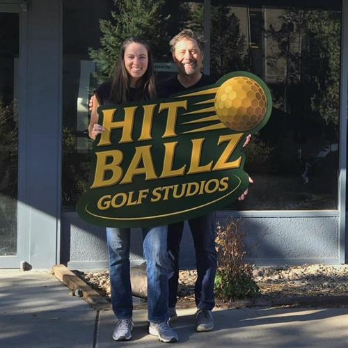 Gallery Image Sharon_and_Jon_holding_Hit_Ballz_Sign.jpeg