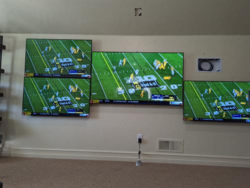 4 of the 5 TVs up and playing the same thing 4 of the 5 TVs up and playing the same thing
