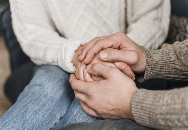 Gallery Image close-up-couple-holding-hands.jpg