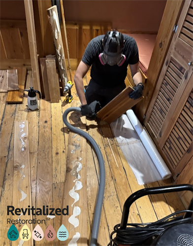 Wood floors restored to a clean, smooth finish, bringing the space back to life.