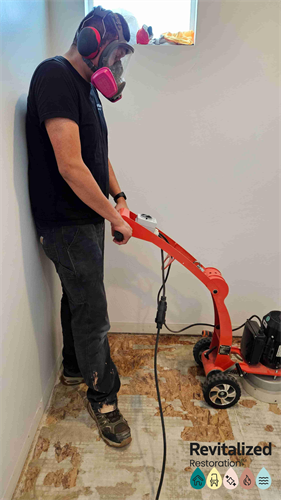 Mitigation foreman on site, using professional equipment to ensure the job is done right.