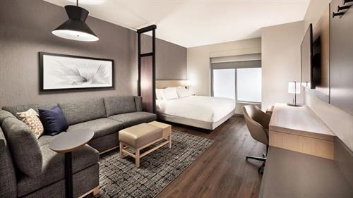 Gallery Image 1_Bedroom_King_Suite_with_Kitchenette_and_Sofa_Bed.jpg