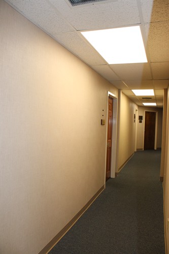 Turn right, then immediately take another right into a long hallway