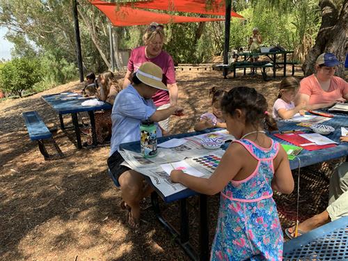 Woman's Club of Vista members volunteering at Kids in the Garden at Alta Vista Botanical Gardens