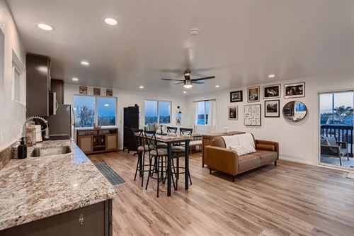 This studio combines sleeping, living, dining, and kitchen spaces into one efficient layout while maintaining comfortable circulation throughout.