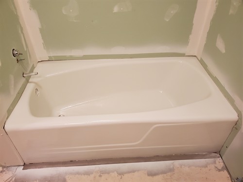 Refinished cast iron bathtub.