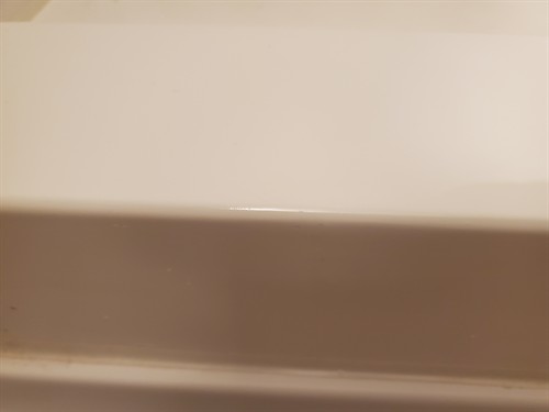 Repaired shower threshold.