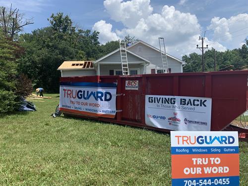 TruGuard partners with Purple Heart Homes in a complete roof replacement for veterans.