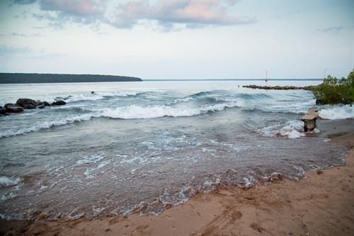 Follow the wooded trail creekside, and you’re a short 10-minute stroll from the sandy, quiet, private Brickyard Creek Community beach on Lake Superior. Follow the wooded trail creekside, and you’re a short 10-minute stroll from the sandy, quiet, private Brickyard Creek Community beach on Lake Superior.