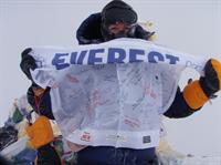 Lori Schneider on summit of Mt. Everest at 29,039ft. - May 2009
