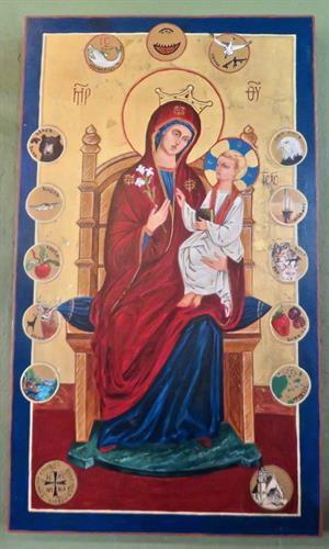 Icon of Madonna and Christ Child with circles depicting Bayfield area's special features.