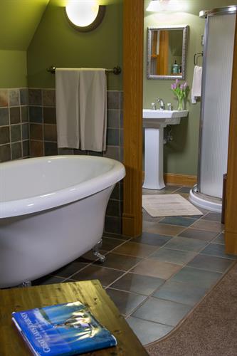 Large clawfoot jetted tub in Whispering Pines Room in our Garden House Large clawfoot jetted tub in Whispering Pines Room in our Garden House