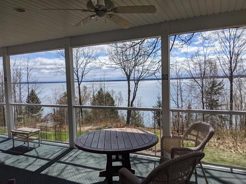 Madeline Island Suite with 1 bedroom, one private bathroom with jacuzzi, and kitchenette while overlooking beautiful Lake Superior from the over-sized deck