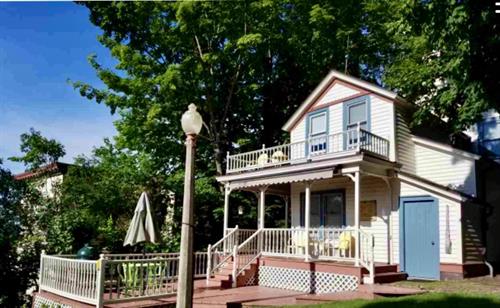A covered porch and deck for outdoor entertaining A covered porch and deck for outdoor entertaining