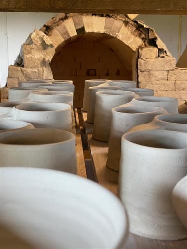 Pots drying for a new firing in the kiln