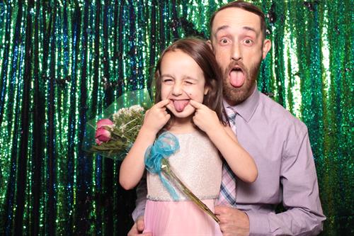 Daddy and Daughter dinners are one of our favs because we love capturing the silliness between the two!