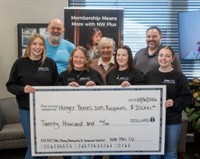 NW Plus CU donates $20,000 to local food banks and food pantries through annual Hunger Heroes fundraiser.