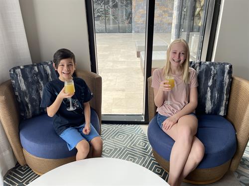 My kiddos living their best life as we check in for our Mexico Vacation!