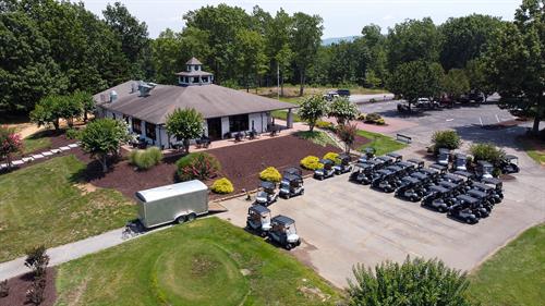Clubhouse with new 2022 Club Car Carts with Visage