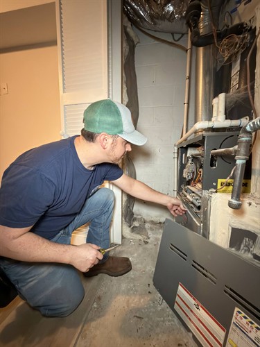 Inspecting furnace during a home inspection