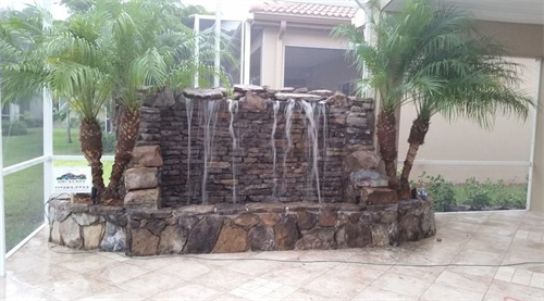 Patio water feature using Ozark Moss and Boulder