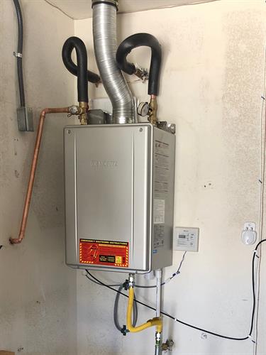 This is a new Tankless Water Heater Installation we switched customer from a traditional tank type Water heater to a Tankless Water Heater. Has a 25 year warranty & Save money on gas too. 