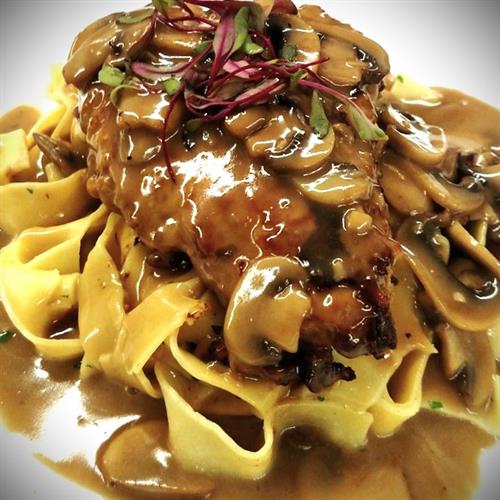 Signature Chicken Marsala with mushrooms and fresh pappardelle