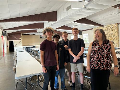 High school boys help the Chamber to set up for Bingo night.