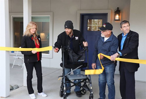 Gallery Image Sykes-KC-ribbon-cutting.jpg