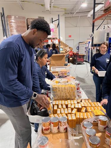 Partner with corporations/companies to help pack weekend food bags