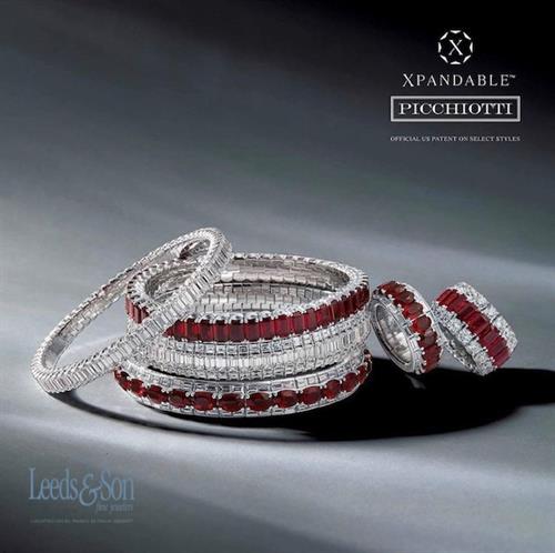 The Xpandable Collection by Pichiotti- Jewelry that expands and contracts easily over the hand or knuckle. Made with fine diamonds, gemstones and set in 18 karat gold or platinum. Available at Leeds & Son in Palm Desert